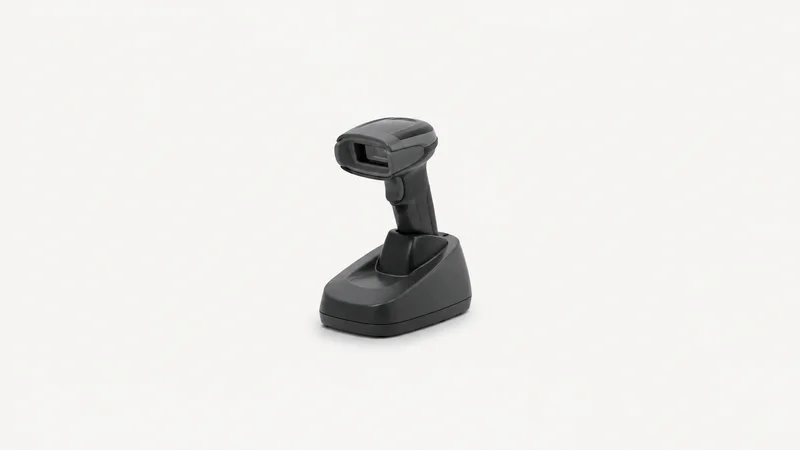 Isolated a cordless barcode scanner in a charging cradle centred on a seamless pale off-white studio background, generous empty margin on every side for overlaid branding