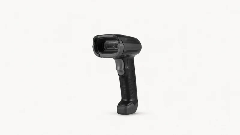 Isolated a rugged handheld barcode scanner with a pistol grip centred on a seamless pale off-white studio background, generous empty margin on every side for overlaid branding