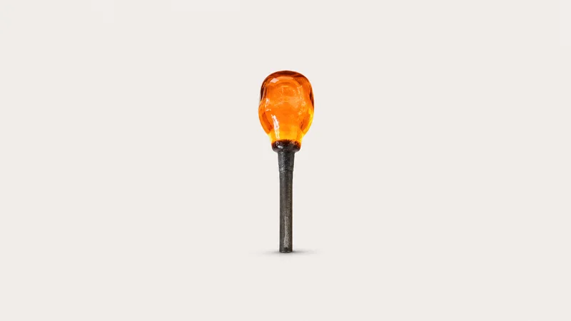 Isolated a gather of molten glass glowing on the end of a steel blowpipe centred on a seamless pale off-white studio background, generous empty margin on every side for overlaid branding
