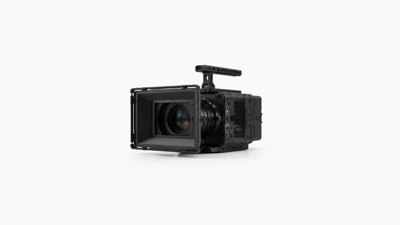 Isolated a cinema camera body with a matte-box hood centred on a seamless pale off-white studio background, generous empty margin on every side for overlaid branding