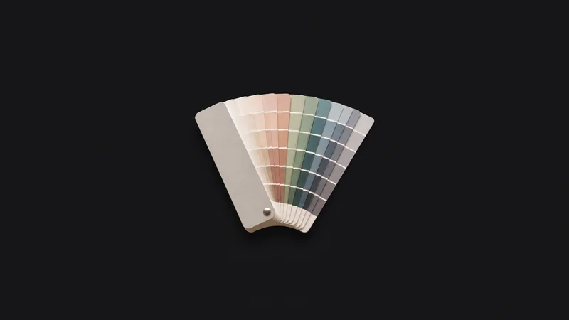 Isolated a fanned deck of printed paint-colour swatch strips centred on a seamless deep charcoal near-black studio background, generous empty margin on every side for overlaid branding