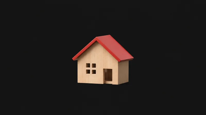 Isolated a wooden house-shaped model with a red pitched roof centred on a seamless deep charcoal near-black studio background, generous empty margin on every side for overlaid branding