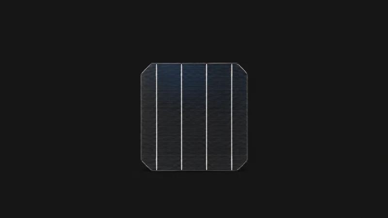 Isolated a monocrystalline solar cell wafer with silver busbars centred on a seamless deep charcoal near-black studio background, generous empty margin on every side for overlaid branding