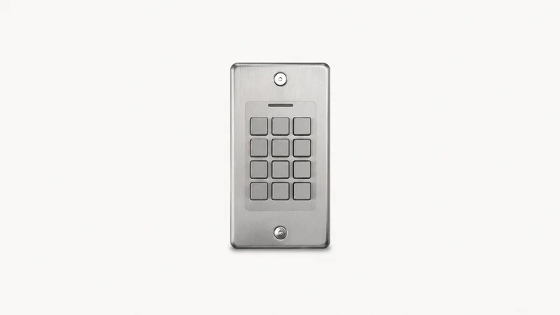 Isolated a keyless entry keypad plate in brushed metal with unmarked buttons centred on a seamless pale off-white studio background, generous empty margin on every side for overlaid branding