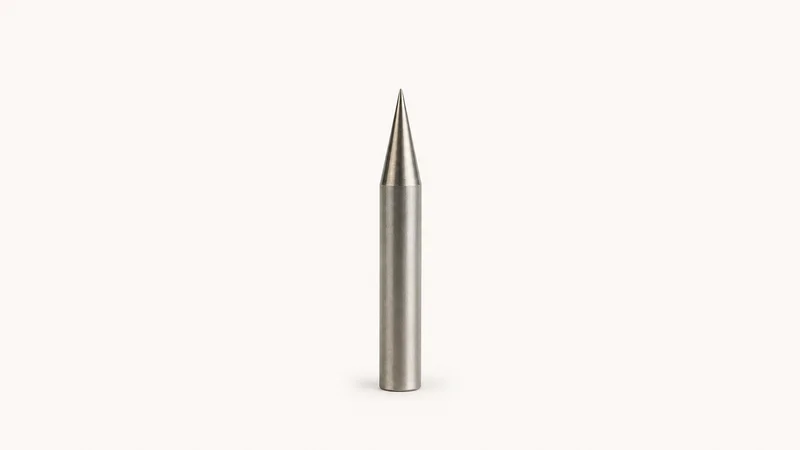 Isolated a tungsten electrode with a ground point centred on a seamless pale off-white studio background, generous empty margin on every side for overlaid branding