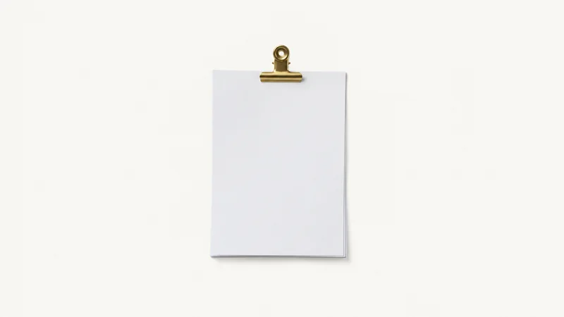 Isolated a stack of blank cv sheets clipped with a brass bulldog clip centred on a seamless pale off-white studio background, generous empty margin on every side for overlaid branding