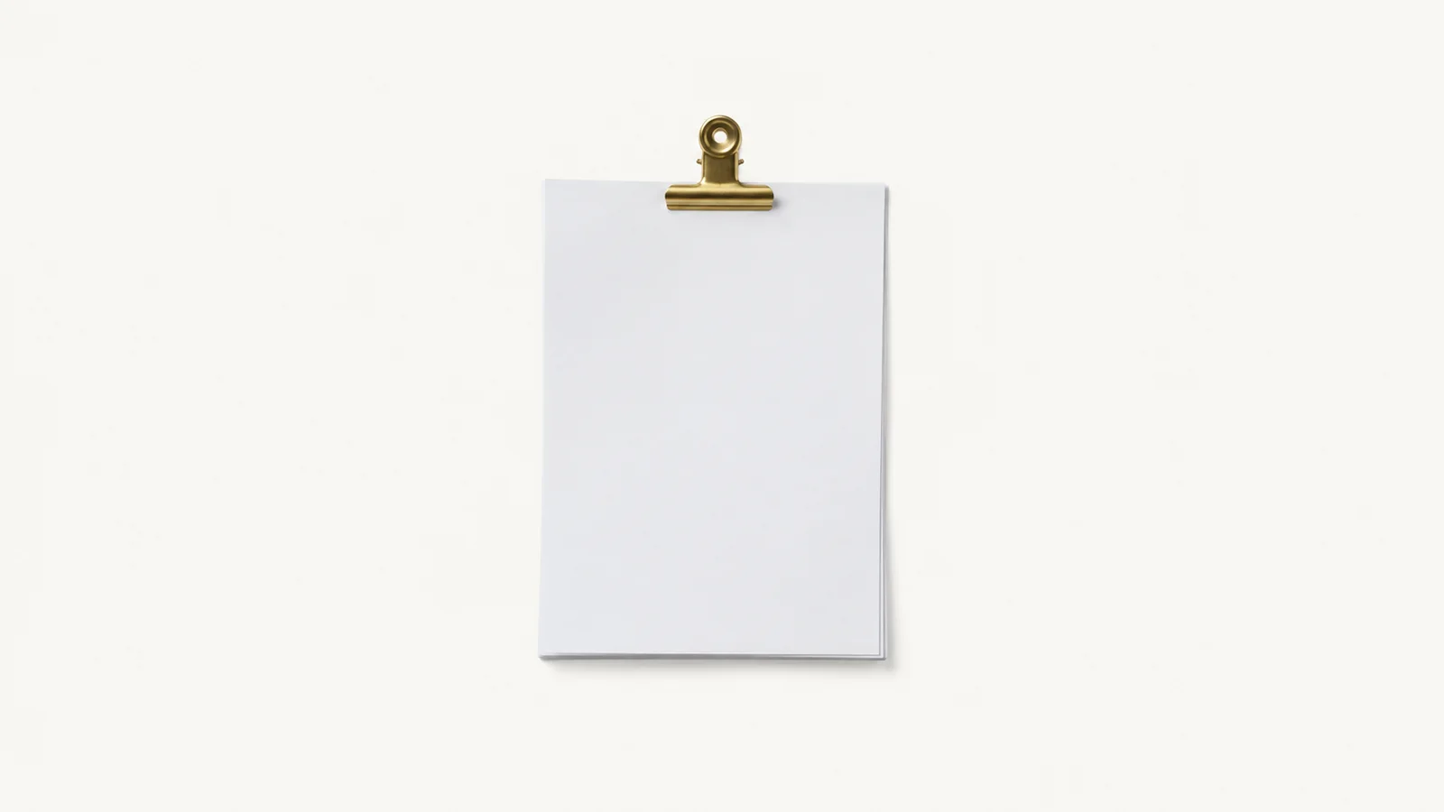 Isolated a stack of blank cv sheets clipped with a brass bulldog clip centred on a seamless pale off-white studio background, generous empty margin on every side for overlaid branding