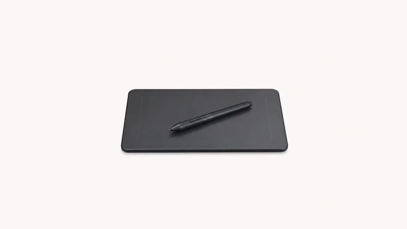 Isolated a stylus pen resting on a slim graphics tablet centred on a seamless pale off-white studio background, generous empty margin on every side for overlaid branding