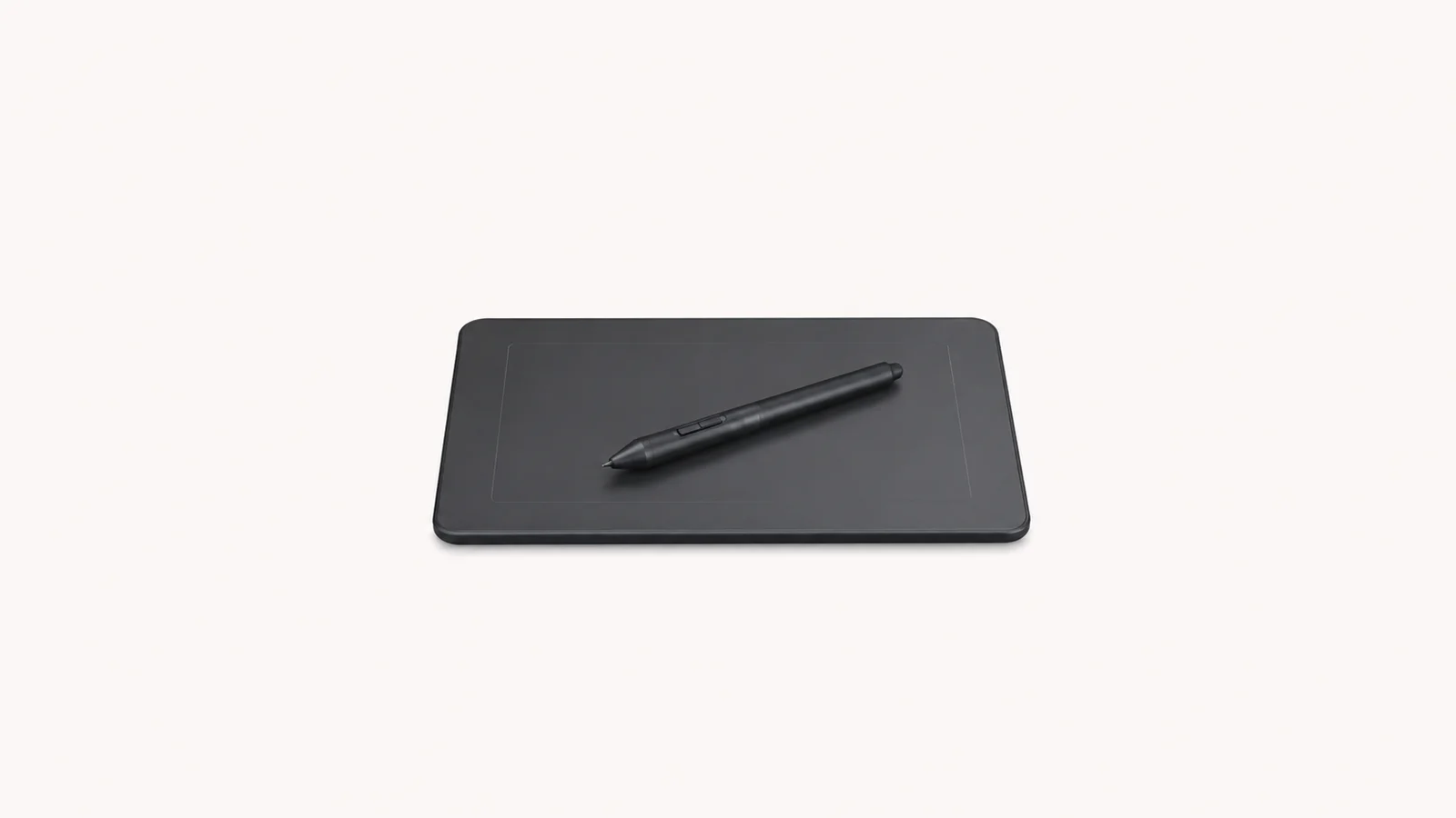 Isolated a stylus pen resting on a slim graphics tablet centred on a seamless pale off-white studio background, generous empty margin on every side for overlaid branding