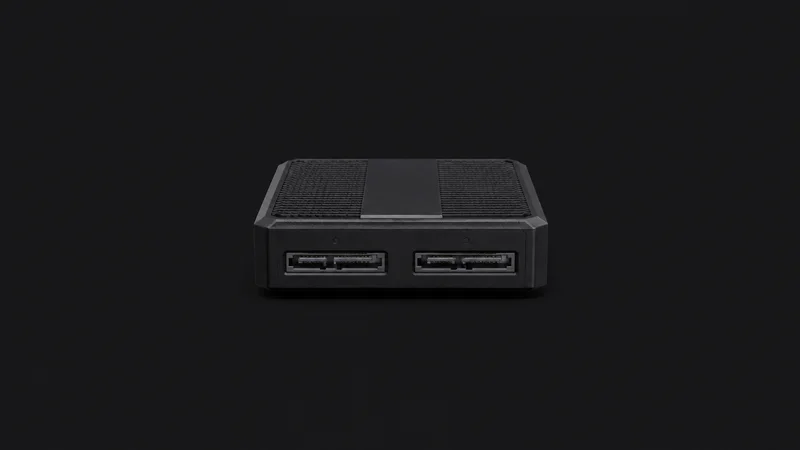 Isolated a forensic write-blocker with twin drive ports centred on a seamless deep charcoal near-black studio background, generous empty margin on every side for overlaid branding