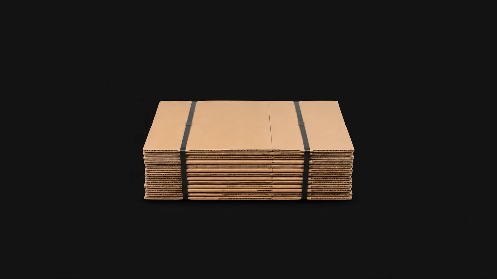 Isolated a stack of flat-packed corrugated courier boxes strapped for delivery centred on a seamless deep charcoal near-black studio background, generous empty margin on every side for overlaid branding