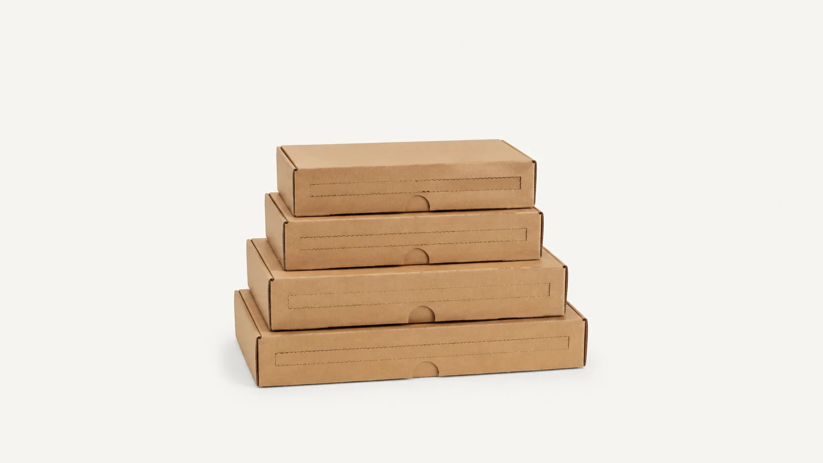 Isolated a stack of flat-pack mailer boxes with tear-strip perforations centred on a seamless pale off-white studio background, generous empty margin on every side for overlaid branding