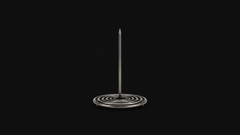 Isolated a receipt spike with a coiled base centred on a seamless deep charcoal near-black studio background, generous empty margin on every side for overlaid branding