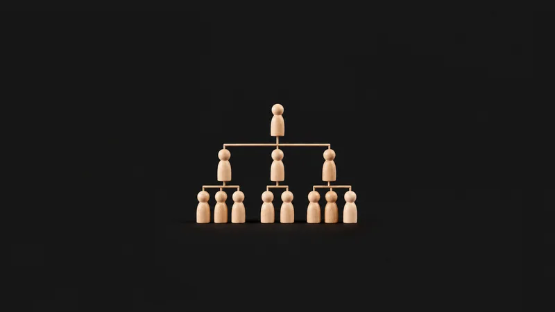 Isolated a set of wooden peg figures arranged in a hierarchy tree centred on a seamless deep charcoal near-black studio background, generous empty margin on every side for overlaid branding