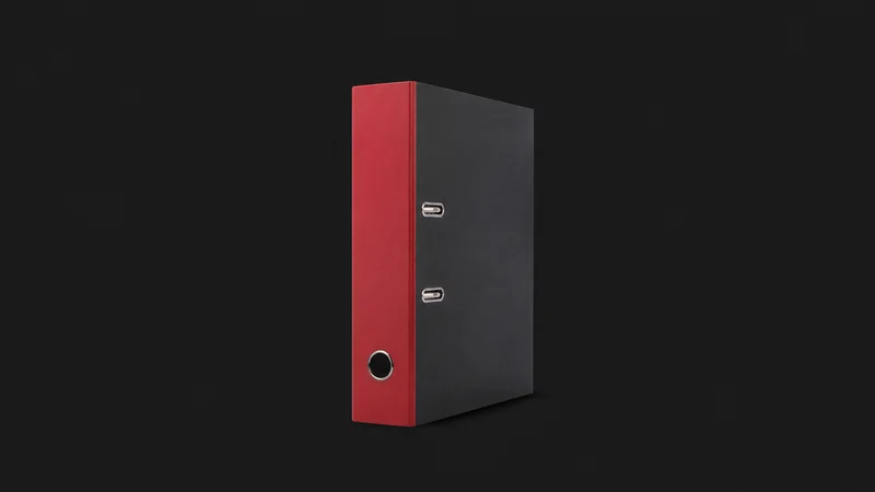 Isolated a lever-arch policy file with a red spine centred on a seamless deep charcoal near-black studio background, generous empty margin on every side for overlaid branding