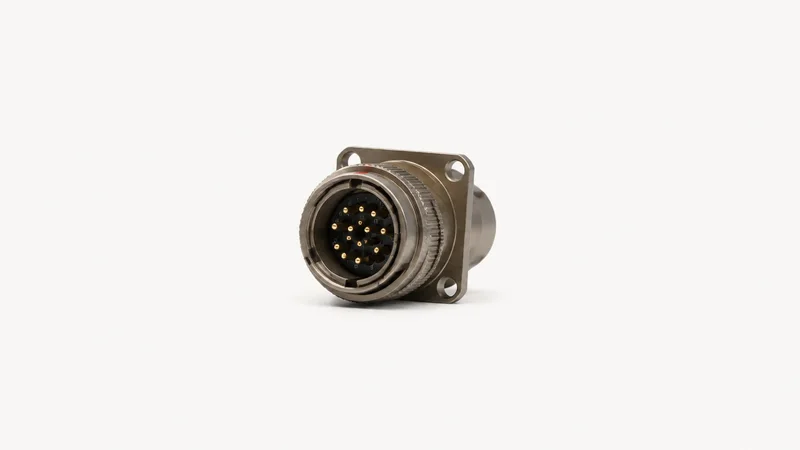 Isolated a mil-spec circular connector with a bayonet shell centred on a seamless pale off-white studio background, generous empty margin on every side for overlaid branding