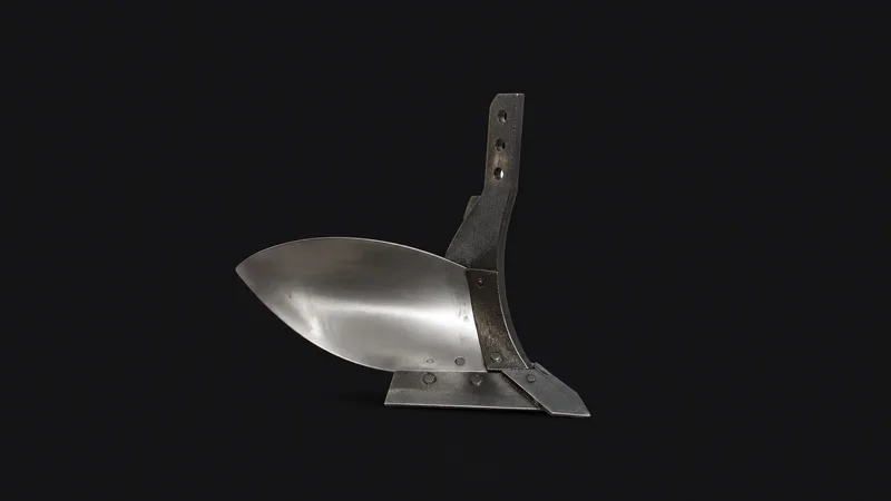 Isolated a cast-iron tractor ploughshare with a polished mouldboard centred on a seamless deep charcoal near-black studio background, generous empty margin on every side for overlaid branding