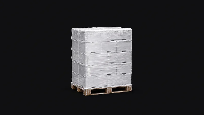 Isolated a frost-dusted stretch-wrapped pallet of white frozen-produce cartons centred on a seamless deep charcoal near-black studio background, generous empty margin on every side for overlaid branding