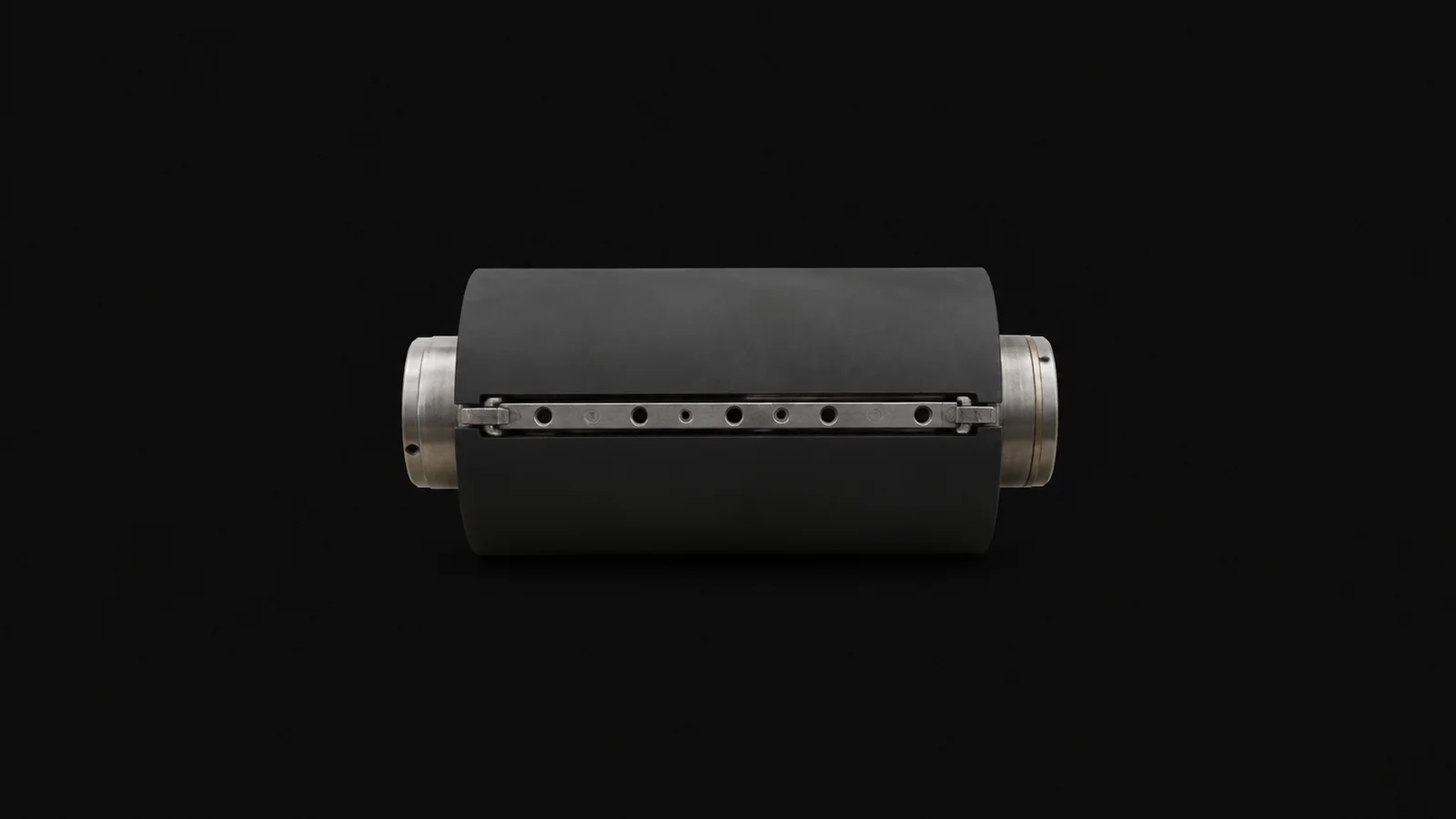 Isolated a rubber offset blanket cylinder section with its clamp bar centred on a seamless deep charcoal near-black studio background, generous empty margin on every side for overlaid branding