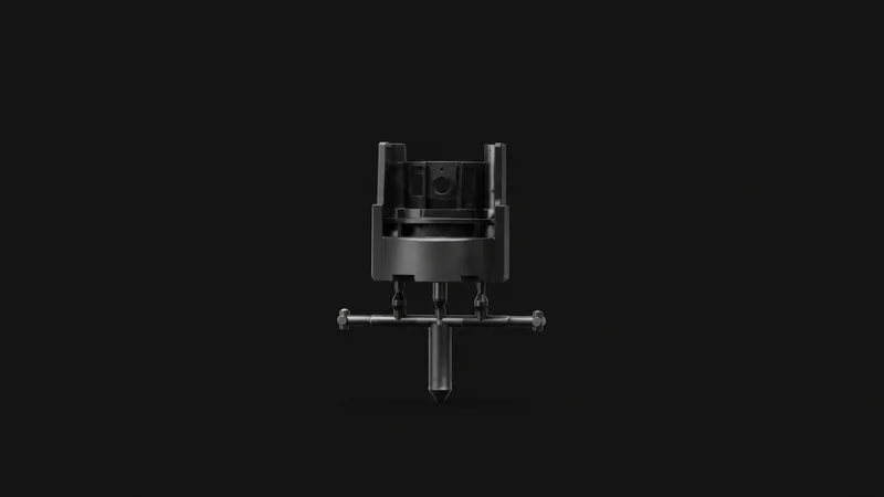 Isolated a moulded polymer part still attached to its runner and sprue centred on a seamless deep charcoal near-black studio background, generous empty margin on every side for overlaid branding