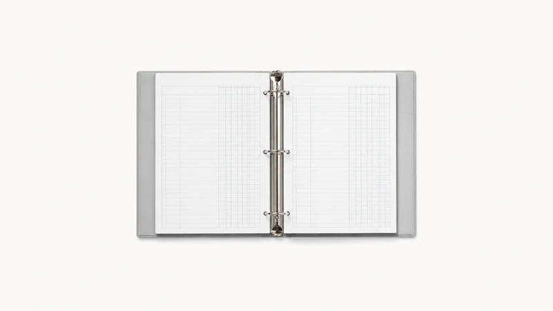 Isolated a ring binder of blank ledger sheets with column rules centred on a seamless pale off-white studio background, generous empty margin on every side for overlaid branding