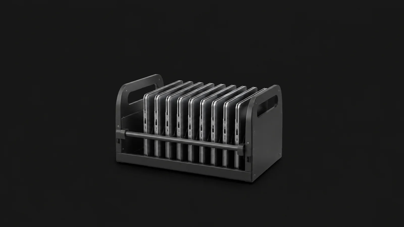Isolated a charging cart tray of stacked student laptops with lids closed centred on a seamless deep charcoal near-black studio background, generous empty margin on every side for overlaid branding