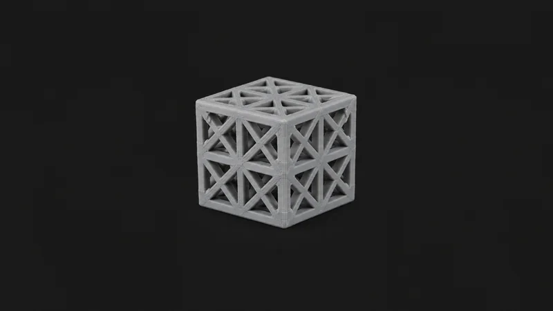 Isolated an fdm-printed lattice cube with visible layer lines in matte grey centred on a seamless deep charcoal near-black studio background, generous empty margin on every side for overlaid branding