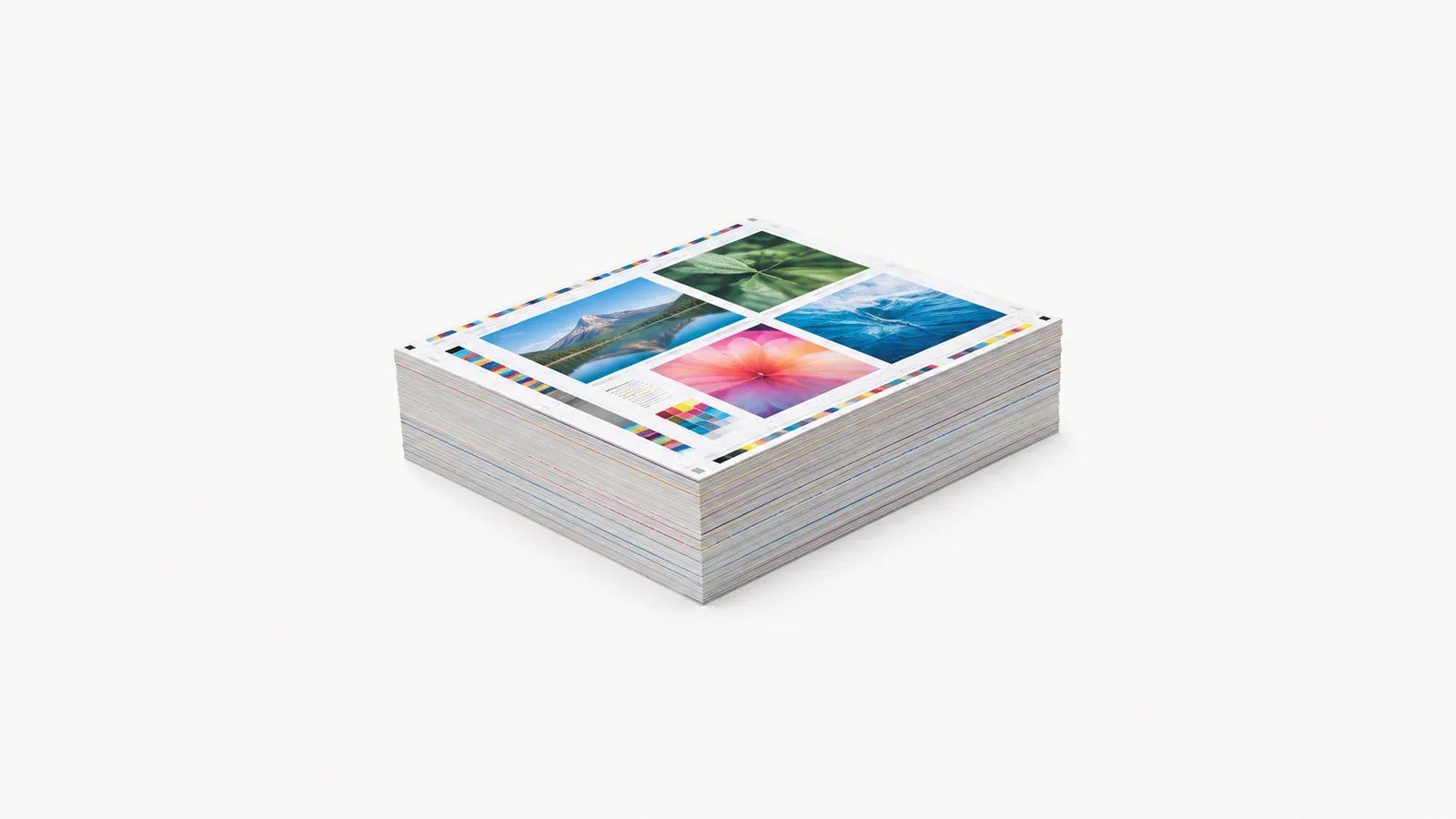 Isolated a stack of uncut cmyk press sheets with colour-control strips on the edge centred on a seamless pale off-white studio background, generous empty margin on every side for overlaid branding