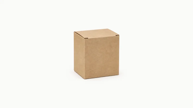 Isolated a folded crash-lock-bottom carton in plain kraft board centred on a seamless pale off-white studio background, generous empty margin on every side for overlaid branding