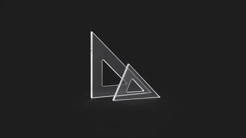 Isolated a set of drafting triangles in clear acrylic centred on a seamless deep charcoal near-black studio background, generous empty margin on every side for overlaid branding