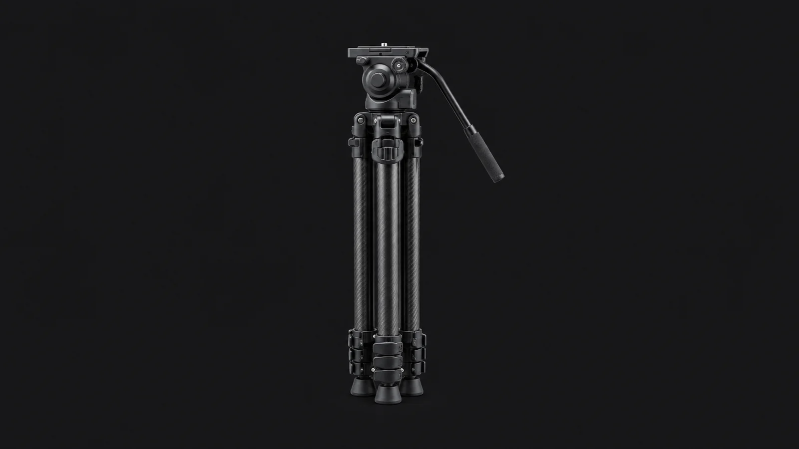 Isolated a fluid-head tripod with folded carbon legs centred on a seamless deep charcoal near-black studio background, generous empty margin on every side for overlaid branding