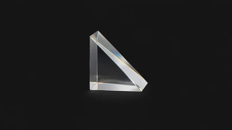 Isolated a right-angle prism of polished optical glass centred on a seamless deep charcoal near-black studio background, generous empty margin on every side for overlaid branding