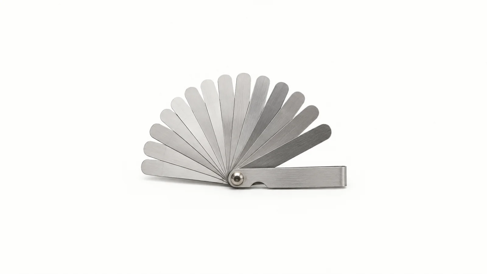 Isolated a set of feeler gauges fanned open centred on a seamless pale off-white studio background, generous empty margin on every side for overlaid branding