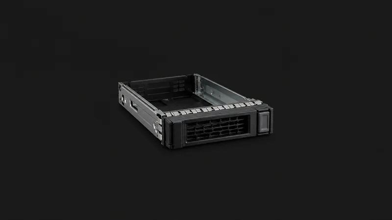 Isolated a hot-swap drive caddy with an empty bay centred on a seamless deep charcoal near-black studio background, generous empty margin on every side for overlaid branding