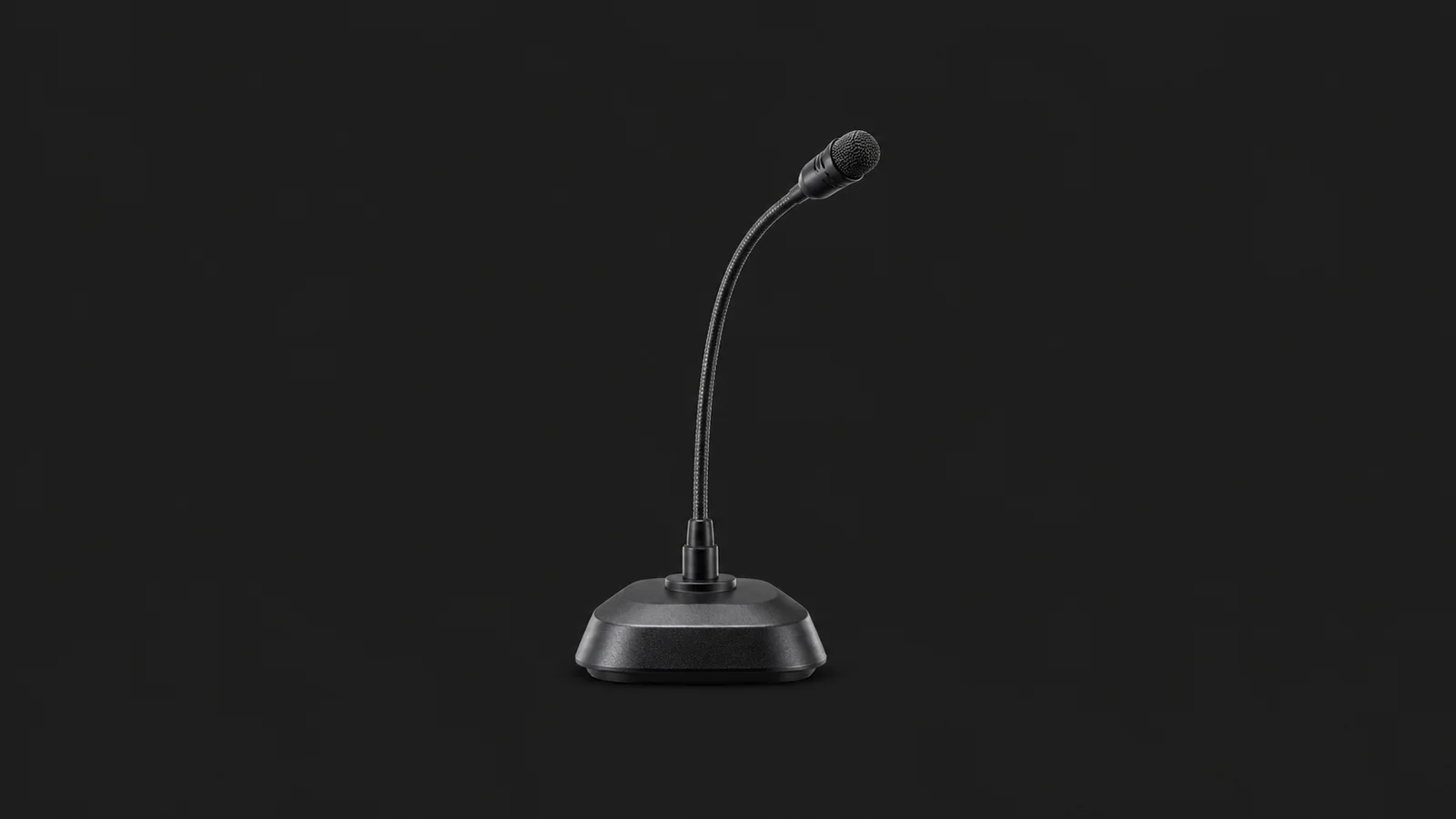 Isolated a courtroom-style desk microphone on a weighted base centred on a seamless deep charcoal near-black studio background, generous empty margin on every side for overlaid branding