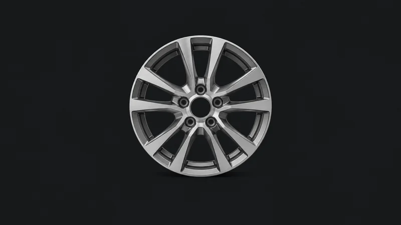 Isolated a car alloy wheel with an unpainted machined face centred on a seamless deep charcoal near-black studio background, generous empty margin on every side for overlaid branding
