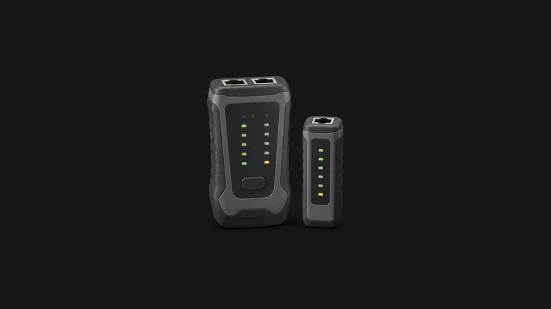Isolated a cable tester with paired remote unit centred on a seamless deep charcoal near-black studio background, generous empty margin on every side for overlaid branding
