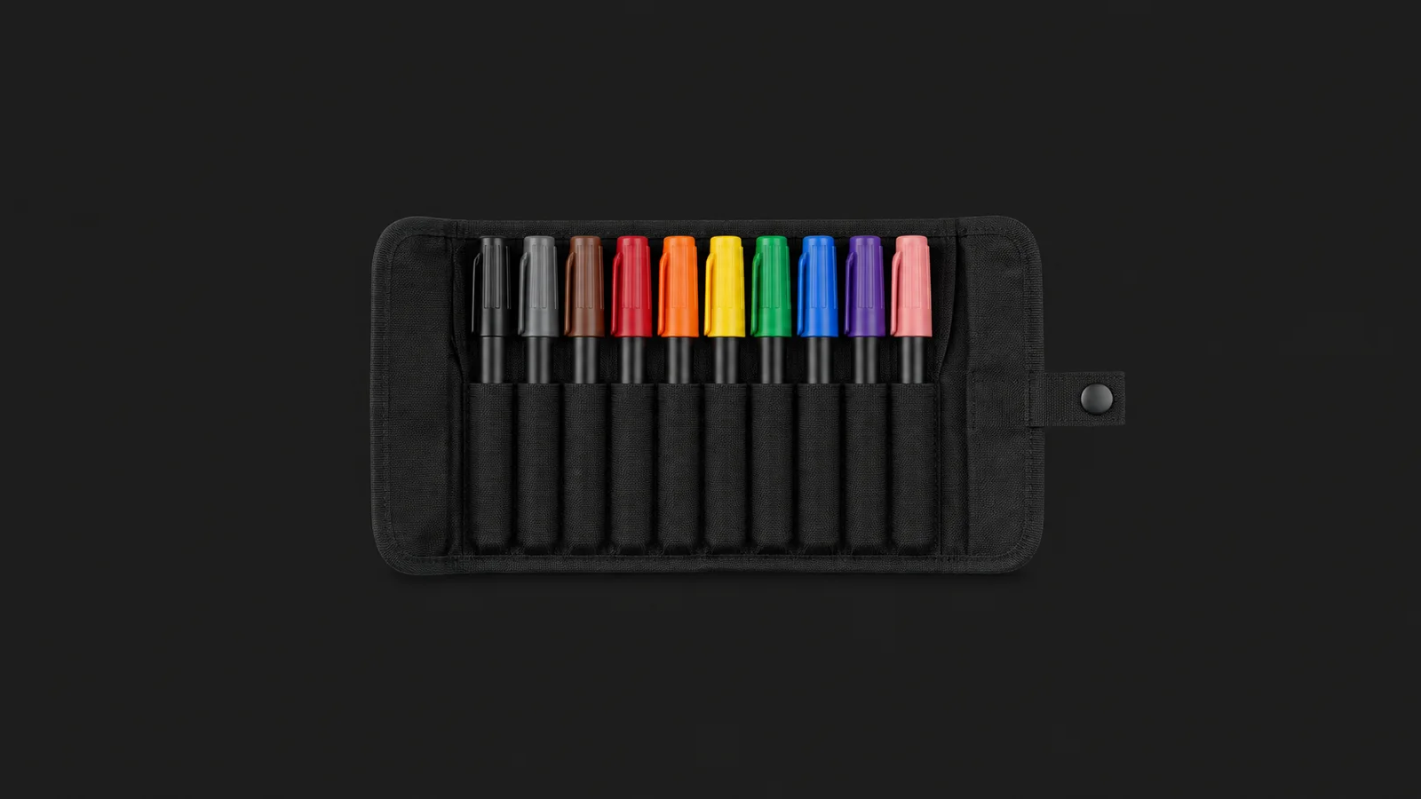 Isolated a set of chunky felt-tip marker pens in a black roll centred on a seamless deep charcoal near-black studio background, generous empty margin on every side for overlaid branding