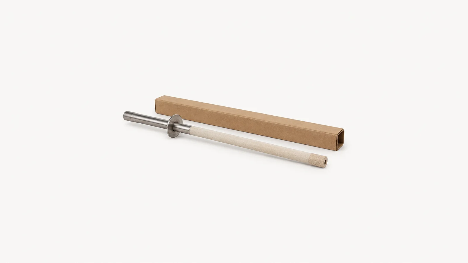 Isolated a molten-steel sampling probe with a cardboard sleeve centred on a seamless pale off-white studio background, generous empty margin on every side for overlaid branding
