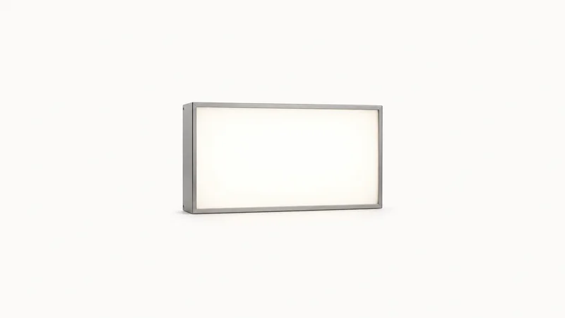 Isolated an illuminated sign box with a flat acrylic face centred on a seamless pale off-white studio background, generous empty margin on every side for overlaid branding