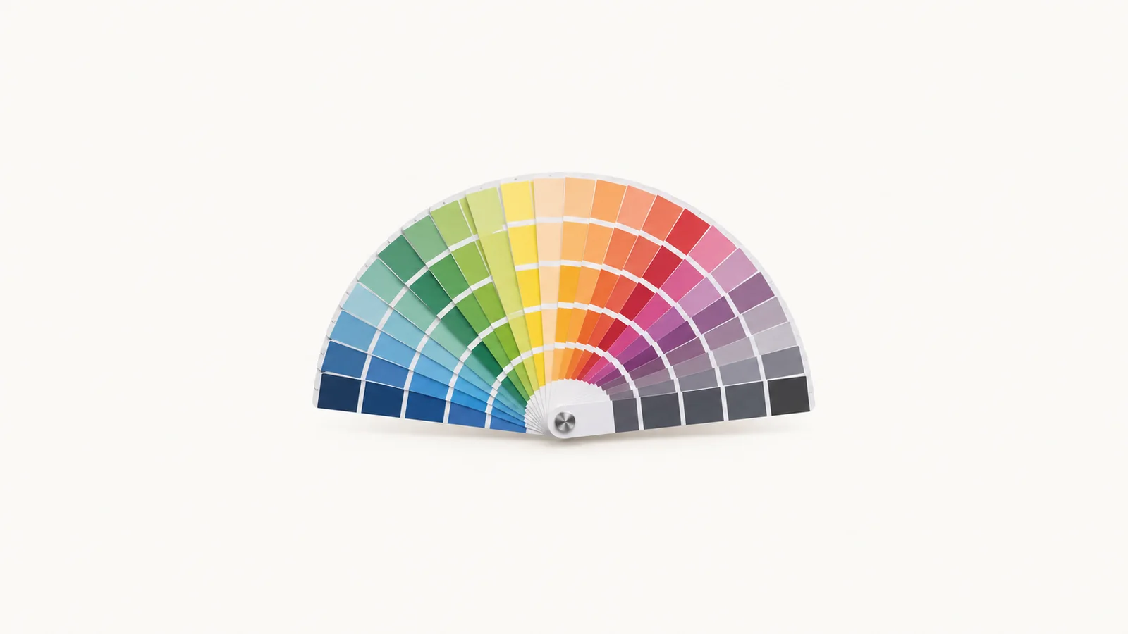 Isolated a spiral-bound cmyk colour-swatch fan opened in a half circle centred on a seamless pale off-white studio background, generous empty margin on every side for overlaid branding
