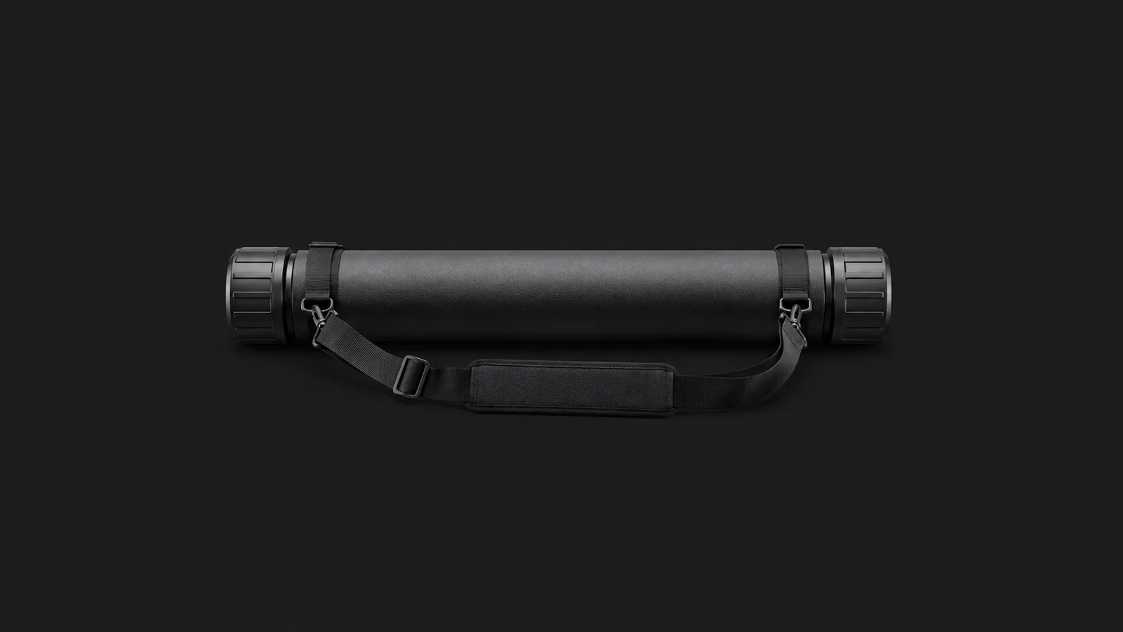 Isolated a drawing tube with a shoulder strap centred on a seamless deep charcoal near-black studio background, generous empty margin on every side for overlaid branding