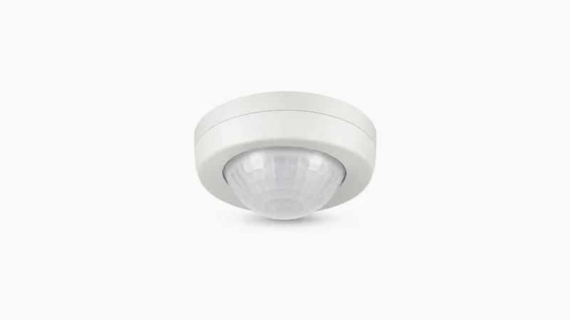 Isolated a ceiling-mount occupancy sensor with a domed lens centred on a seamless pale off-white studio background, generous empty margin on every side for overlaid branding