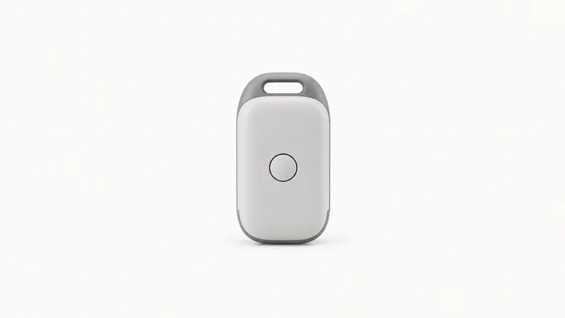 Isolated a shipment temperature-logger dongle with a single unmarked button centred on a seamless pale off-white studio background, generous empty margin on every side for overlaid branding