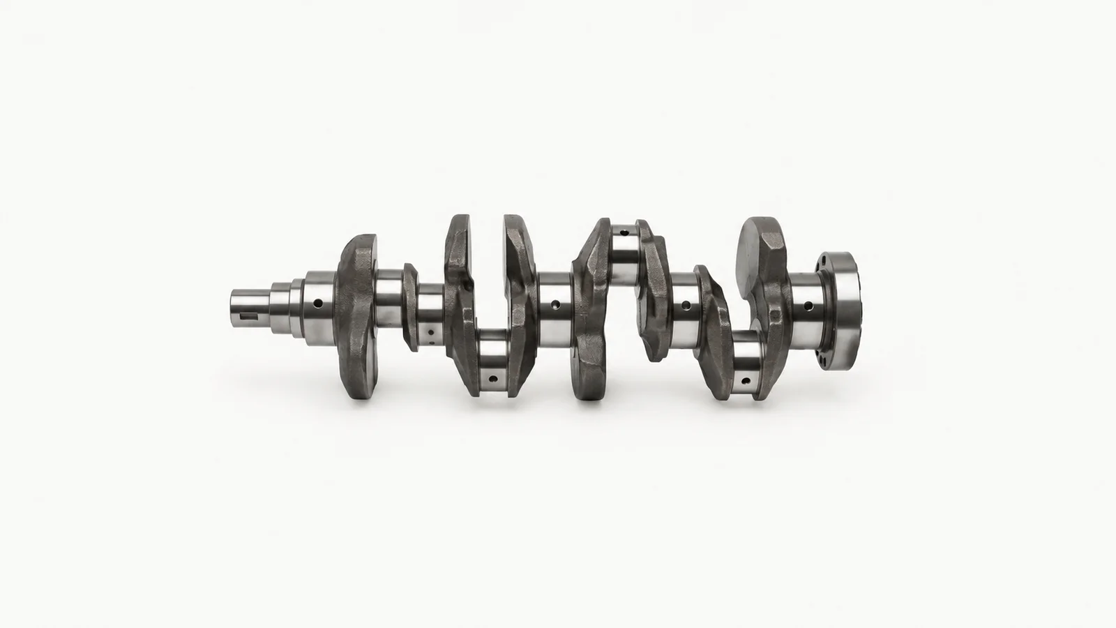 Isolated a car crankshaft with polished journals centred on a seamless pale off-white studio background, generous empty margin on every side for overlaid branding