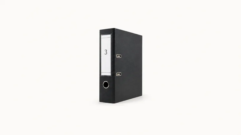 Isolated a numbered lever-arch file with a spine label window centred on a seamless pale off-white studio background, generous empty margin on every side for overlaid branding