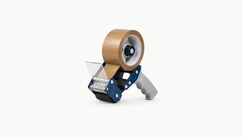 Isolated a roll of brown packing tape in a hand-held tape gun centred on a seamless pale off-white studio background, generous empty margin on every side for overlaid branding