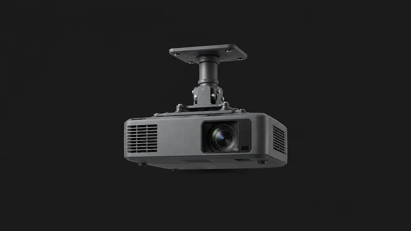 Isolated a ceiling-mount short-throw classroom projector on a bracket centred on a seamless deep charcoal near-black studio background, generous empty margin on every side for overlaid branding