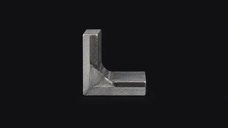 Isolated a welded steel corner joint cut for macro inspection centred on a seamless deep charcoal near-black studio background, generous empty margin on every side for overlaid branding