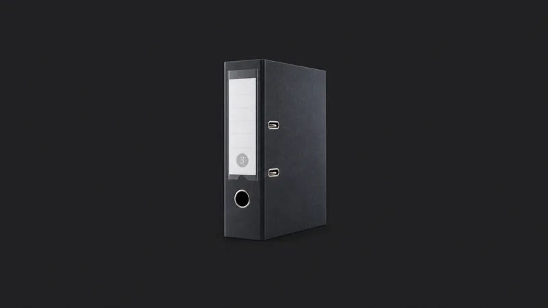 Isolated a numbered lever-arch file with a spine label window centred on a seamless deep charcoal near-black studio background, generous empty margin on every side for overlaid branding